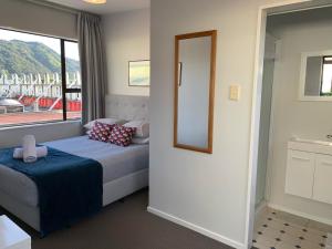 
Ein Bett oder Betten in einem Zimmer der Unterkunft The Villa
