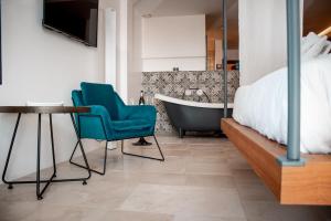 Area soggiorno di Antico Mondo Rooms & Suites