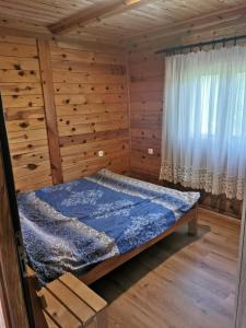 Postel nebo postele na pokoji v ubytování Vila Zboriste