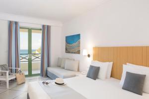 Postel nebo postele na pokoji v ubytování Samaina Inn + 37 fotografií