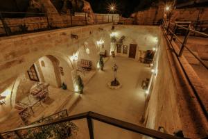 an overhead view of a courtyard at night with lights at Harkasos Cave Hotel in Urgup