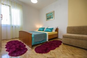 Posteľ alebo postele v izbe v ubytovaní Holiday House ALMISSA