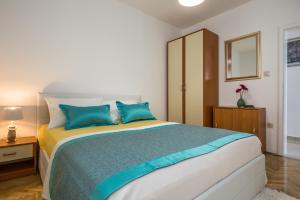 Posteľ alebo postele v izbe v ubytovaní Holiday House ALMISSA