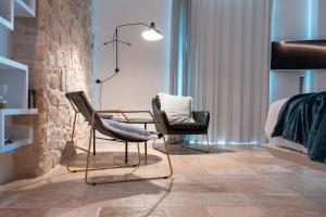 Area soggiorno di Antico Mondo Rooms & Suites