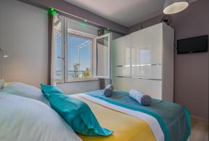 Posteľ alebo postele v izbe v ubytovaní Holiday House ALMISSA