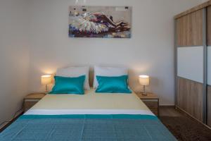 Posteľ alebo postele v izbe v ubytovaní Holiday House ALMISSA