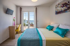 Posteľ alebo postele v izbe v ubytovaní Holiday House ALMISSA