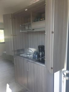 A kitchen or kitchenette at Residence Mare e Monte