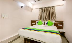 Lova arba lovos apgyvendinimo įstaigoje Treebo Trend Kings Inn Vashi