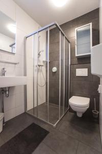 Koupelna v ubytování Hotel Faber + 37 fotografií