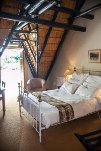 En eller flere senge i et værelse på Steynshoop Mountain Lodge (Hotel)