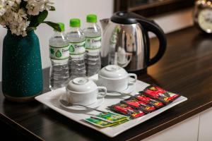 Příslušenství pro přípravu čaje a kávy v ubytování Sapa Valley view hotel