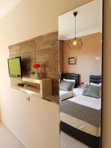 Postel nebo postele na pokoji v ubytování Papirus Hotel