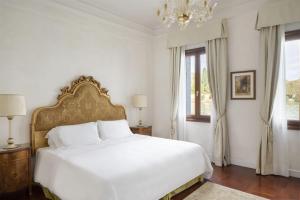 Un ou plusieurs lits dans un hébergement de l'établissement Hotel Cipriani, A Belmond Hotel, Venice