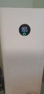 a white refrigerator with a sticker on the side of it at Hotel Apartamento Bajamar in Las Palmas de Gran Canaria
