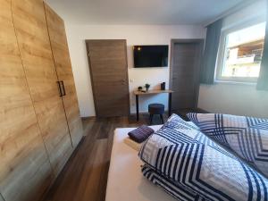 Postel nebo postele na pokoji v ubytování Beim Nannerl