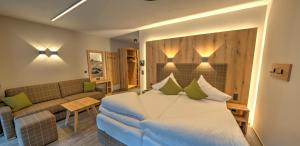 Rúm í herbergi á Der Siegeler B&B - this lifestylehotel rocks