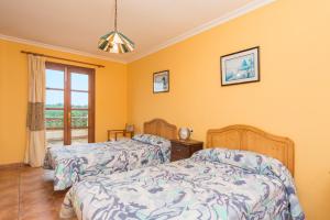 Postel nebo postele na pokoji v ubytování Clau De Sol