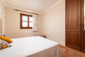 Postel nebo postele na pokoji v ubytování Clau De Sol