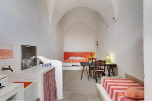Postel nebo postele na pokoji v ubytování Masseria Tornesella Don Giuliano + 37 fotografií