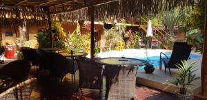 Bazén v ubytování Samara Palm Lodge nebo v jeho okolí