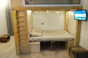 Ένα ή περισσότερα κρεβάτια σε δωμάτιο στο Chaleureux petit appartement de 4 couchages