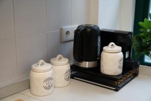 Příslušenství pro přípravu čaje a kávy v ubytování Clery Porto