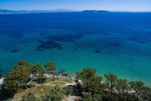 an aerial view of a large body of water at Villa Victoria by La Scala Beach in Limenas
