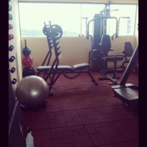 a room with a gym with exercise equipment in it at Magnífico Flat no melhor de Manaíra - Apart Hotel in João Pessoa