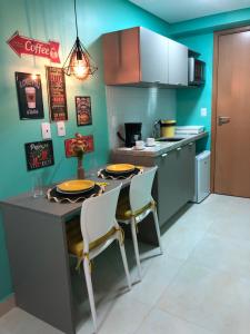 Kuchyňa alebo kuchynka v ubytovaní Magnífico Flat no melhor de Manaíra - Apart Hotel