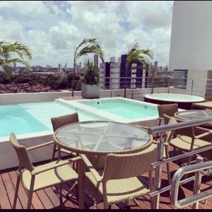 Bazén v ubytovaní Magnífico Flat no melhor de Manaíra - Apart Hotel alebo v jeho blízkosti