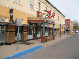 an empty street in front of a fast food restaurant at Historic Palace Hotel in Silver City
