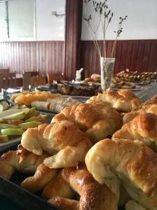a table topped with different types of pastries at La Nueva Romana in Santa Clara del Mar
