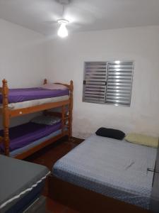 Katil atau katil-katil dalam bilik di Casa da sy +18 gambar