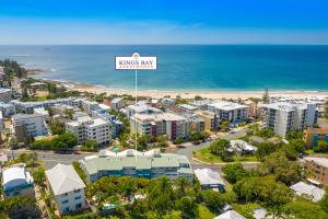 
a large building with a view of the ocean at Kings Bay Apartments in Caloundra
