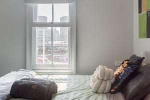 a bedroom with a bed and a window with a view at 1 Private Double Room in Sydney CBD Near Train UTS DarlingHar&ICC&Chinatown with ensuite - ROOM ONLY in Sydney
