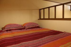 Cama ou camas em um quarto em Funky Monkey Lodge, Myoko ファンキーモンキーロッジ 妙高