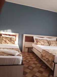 Postel nebo postele na pokoji v ubytování Mar-Mari's