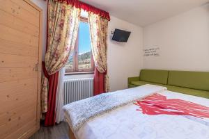 Postelja oz. postelje v sobi nastanitve Hotel Arcangelo 3 stelle Superior