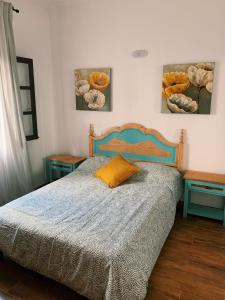 En eller flere senge i et værelse på CASA MAREA