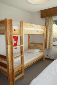 Postel nebo postele na pokoji v ubytování Magrappé MOUNTAIN & CENTER apartments