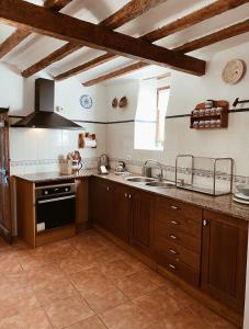 A kitchen or kitchenette at Masía La Costereta