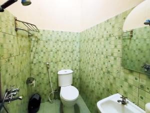 Koupelna v ubytování Bakom Inn Syariah + 30 fotografií