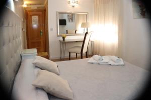 Posteľ alebo postele v izbe v ubytovaní Hotel Principe