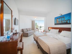 Voodi või voodid majutusasutuse Avlida Hotel toas