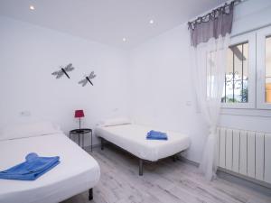 Posteľ alebo postele v izbe v ubytovaní Holiday Home Casa Encinas by Interhome