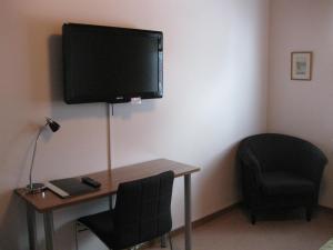 Μια τηλεόραση ή/και κέντρο ψυχαγωγίας στο Hotell Samegård
