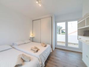 Posteľ alebo postele v izbe v ubytovaní Holiday Home Los Frasquitos by Interhome