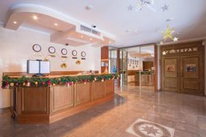 a restaurant with christmas decorations on the counter at Shery Holl in Rostov on Don