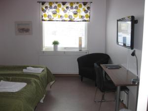 Postel nebo postele na pokoji v ubytování Hotell Samegård + 20 fotografií